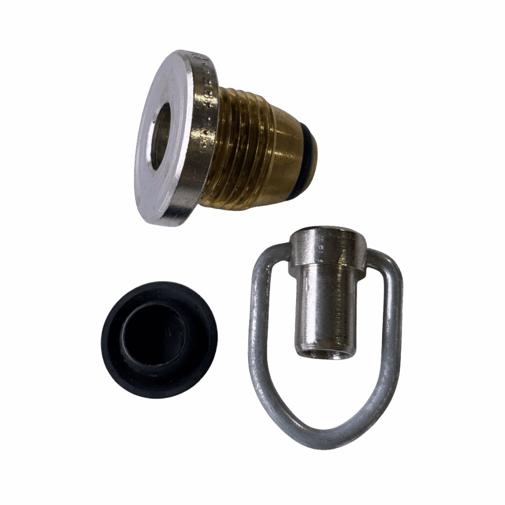 Components of a fire sprinkler system laid out on a gray surface.