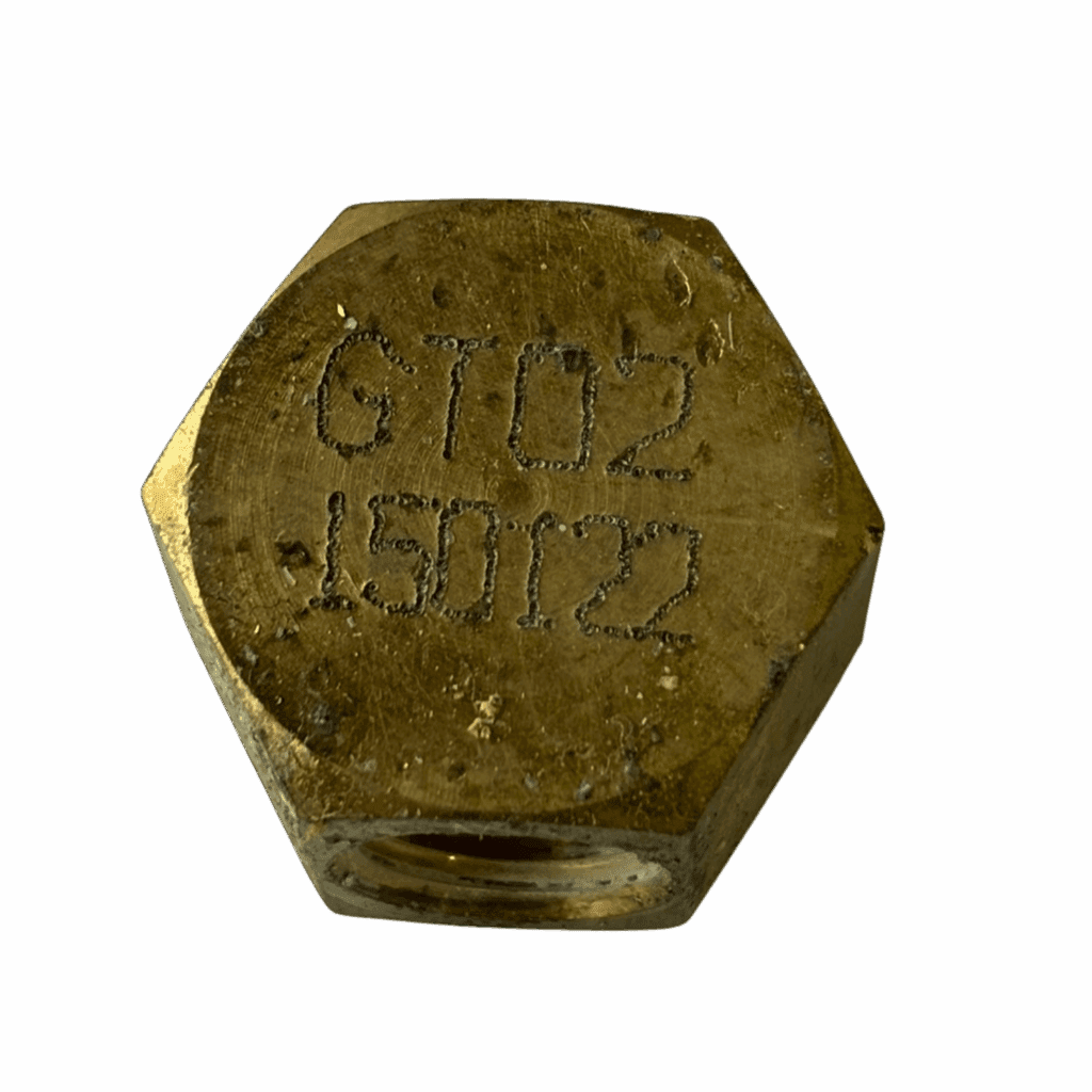 A rusty hexagonal bolt head with engraved numbers.