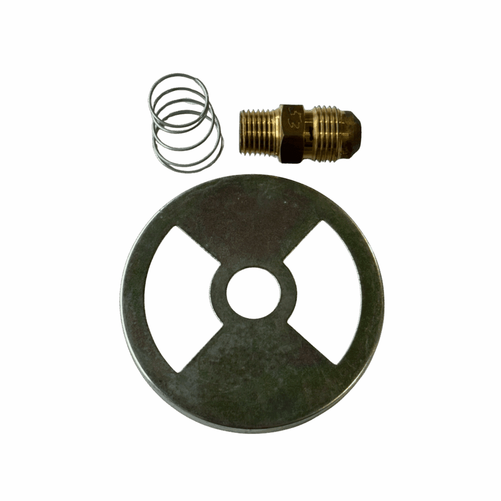 Metal wheel with a spring and a brass fitting on a gray background.