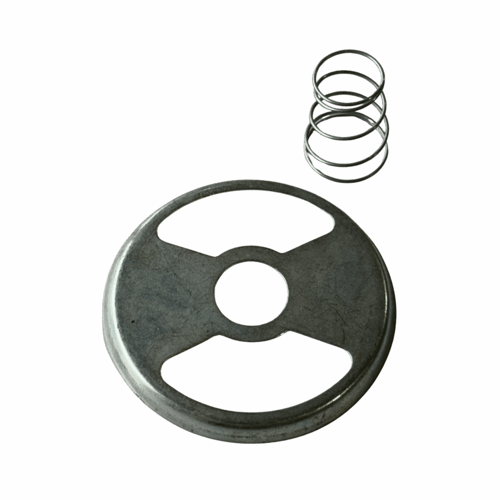 Metal valve handle and a small coil spring on a gray background.