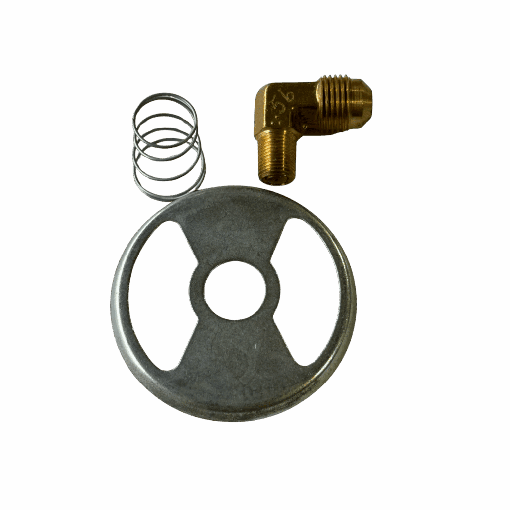 Metal valve wheel with a spring and brass elbow fitting on a green background.