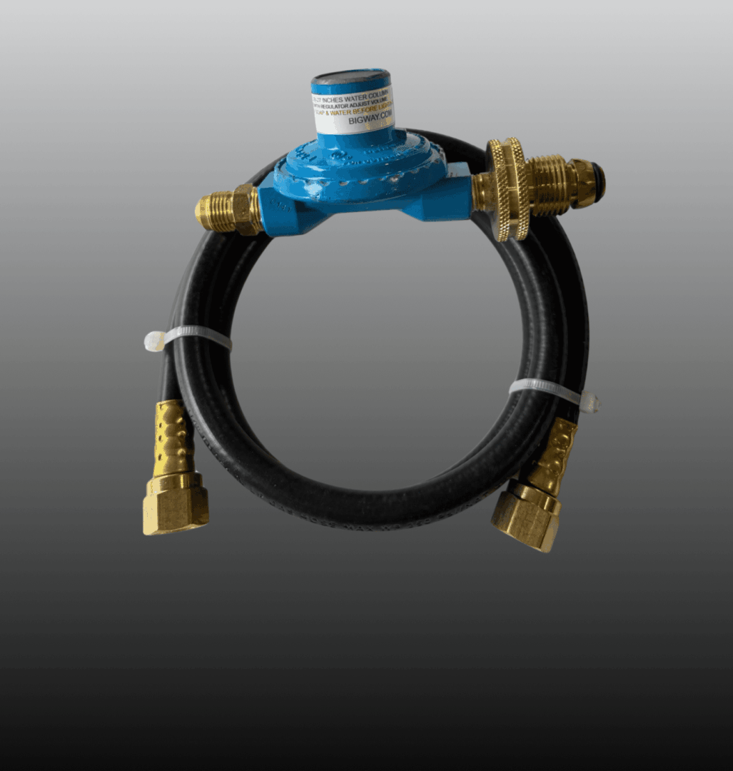 Portable gas regulator with hose and brass fittings.