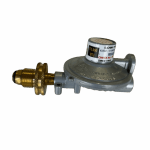 A metallic gas regulator with brass fittings on a gray background.