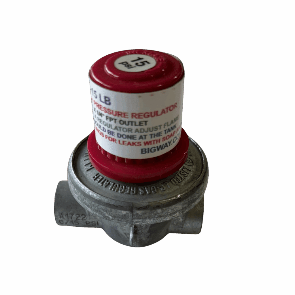 A red and silver industrial gas regulator with warning labels.