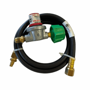 Gas regulator with hose and brass fittings.