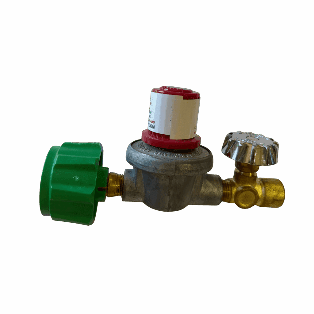 A gas regulator valve with green and brass components.
