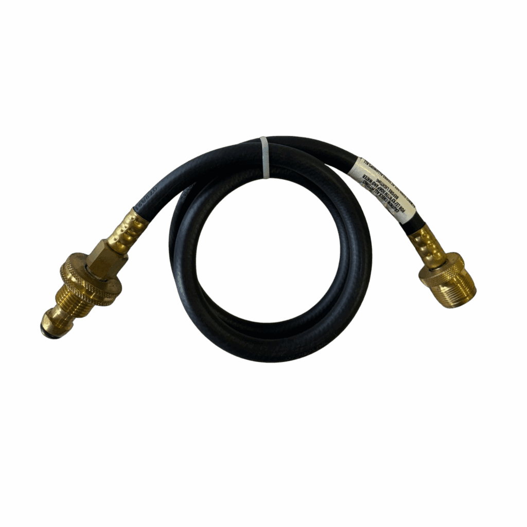 A coiled black hose with brass fittings at both ends.