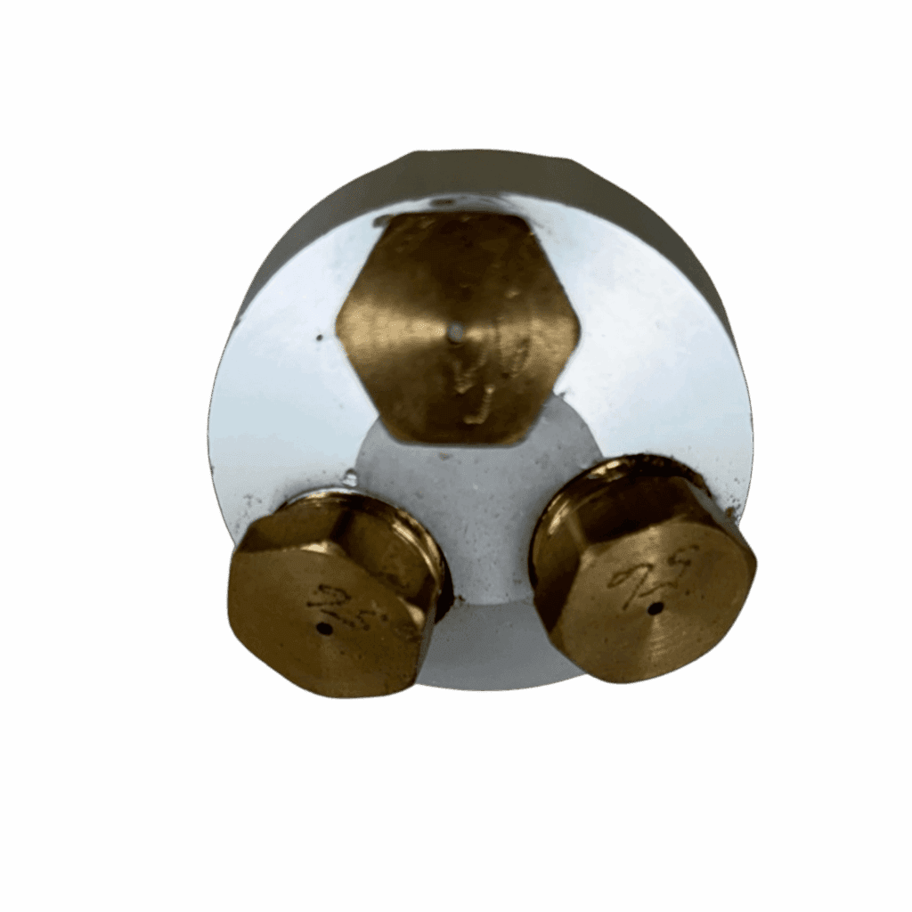 A shiny metallic object with gold accents and three round elements.