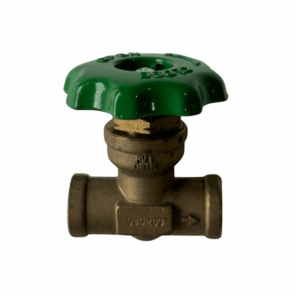 A green-handled brass water valve against a dark background.