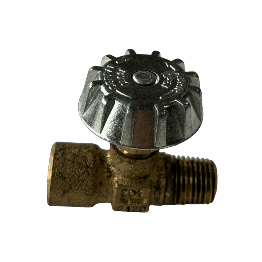 Old brass valve with a round metal handle.