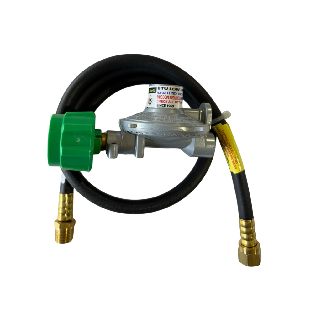 Gas regulator with hose and connectors.